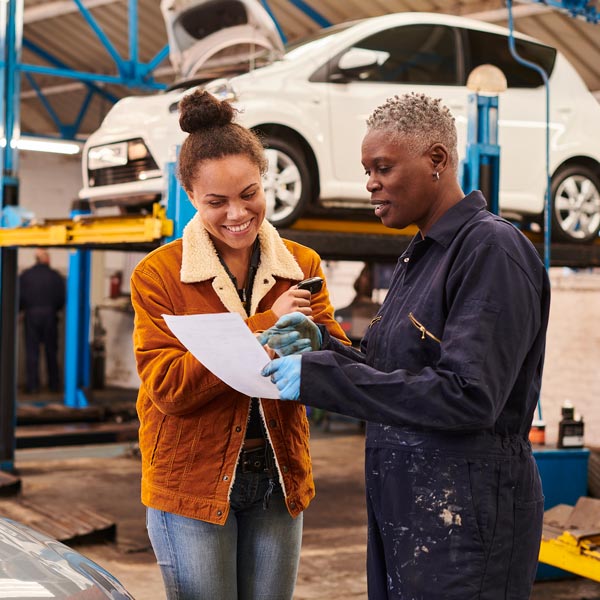 mechanic showing customer diagnostic report