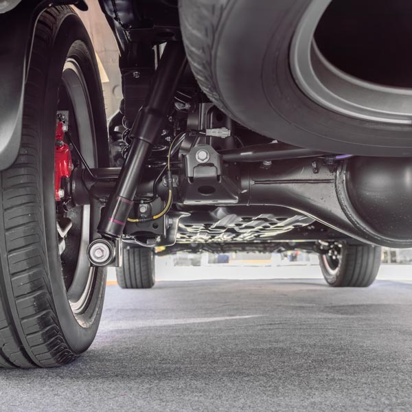 car underbody showing shocks and differential